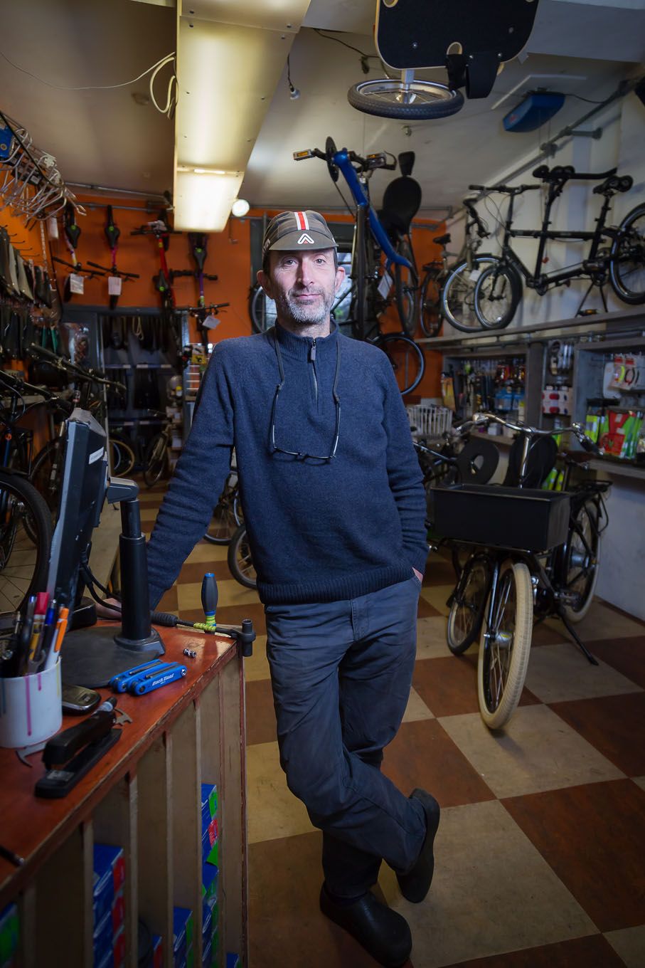Portrait of a bike shop owner in London Bloomsbury